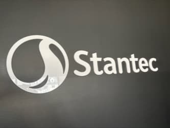 Existing acrylic lobby sign used as the reference